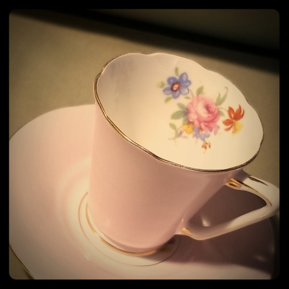 Antique tea cup and saucer, 1each.